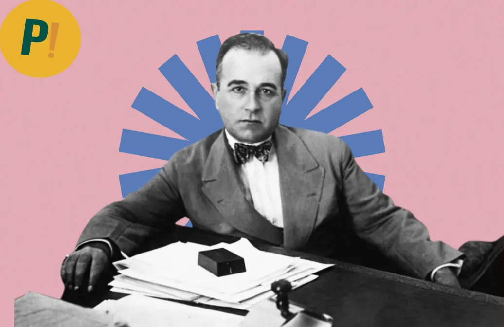Getúlio Vargas sentado em uma mesa