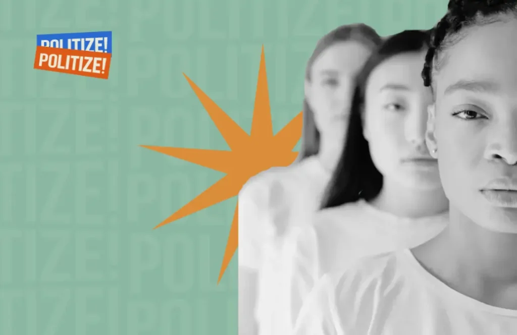 Mulher negra a frente, mulher asiática logo atrás, e mulher loira ao fundo